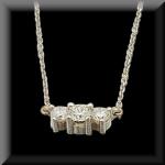 Raymond Jewelers three stone pendant in 14K White gold