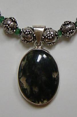detail of sterling silver moss agate pendant