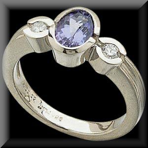 Bezel Set Ladies Platinum, Diamond and Tanzanite Ring