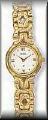 Raymond Jewelers :  Classy gold tone Belair wrist watch. Terrific 3 year limited warranty. Your choice of two dial colors, burgundy or white! Details here!