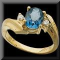 Glamorous London Blue Topaz and Diamond Ring in 14K Gold