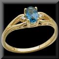Petite Oval Cut London Blue Topaz and Diamond Ladies Ring 14K