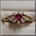 Raymond Jewelers :  to Specials!  Beautiful genuine, quality ruby and diamond ladies ring is now of closeout!  One left!   Reg. Price $479.00 Closeout Sale Price $299.00